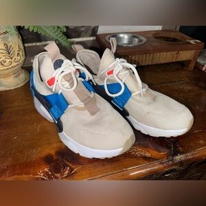 Nike women Beige Sneakers with Blue and Red Accents